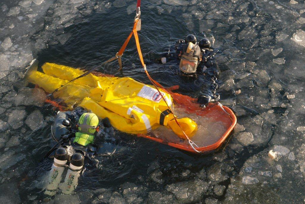 Manikin being used in practice emergency situation